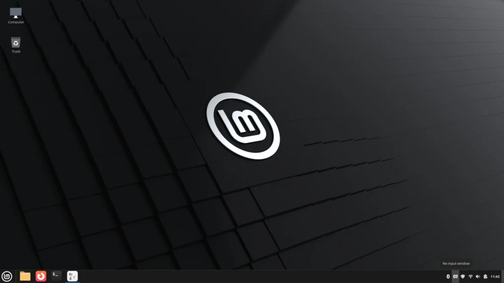 Clean Linux Mint Cinnamon desktop showing taskbar and system tray