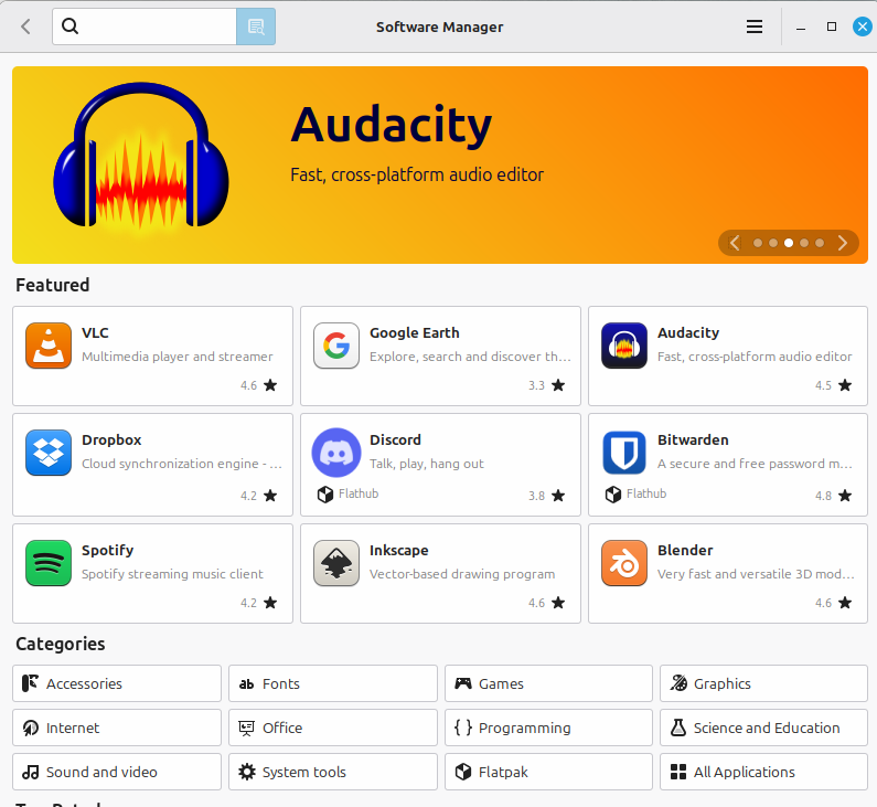 Linux Mint Software Manager showing available applications like Audacity and system tools