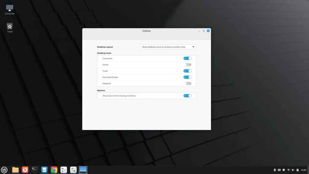 Linux Mint desktop settings window showing options to enable Home, Computer, and Trash icons